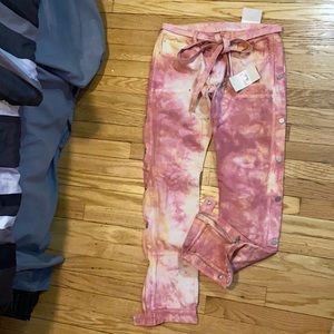 Tie dye denim jeans.